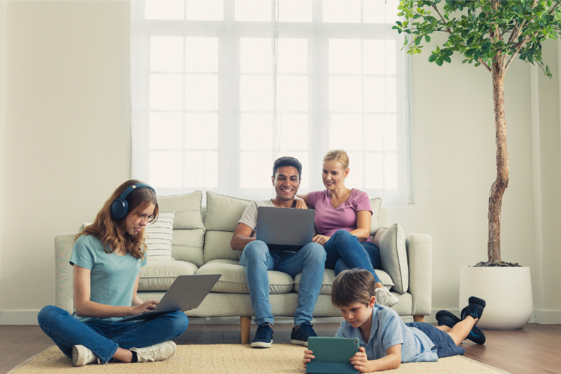 Zoom Fibre | A Parent And Children Using A Laptop Smartphone I 2025 02 12 03 33 34 UtcThe Benefits of Fibre Over ADSLIndustry News